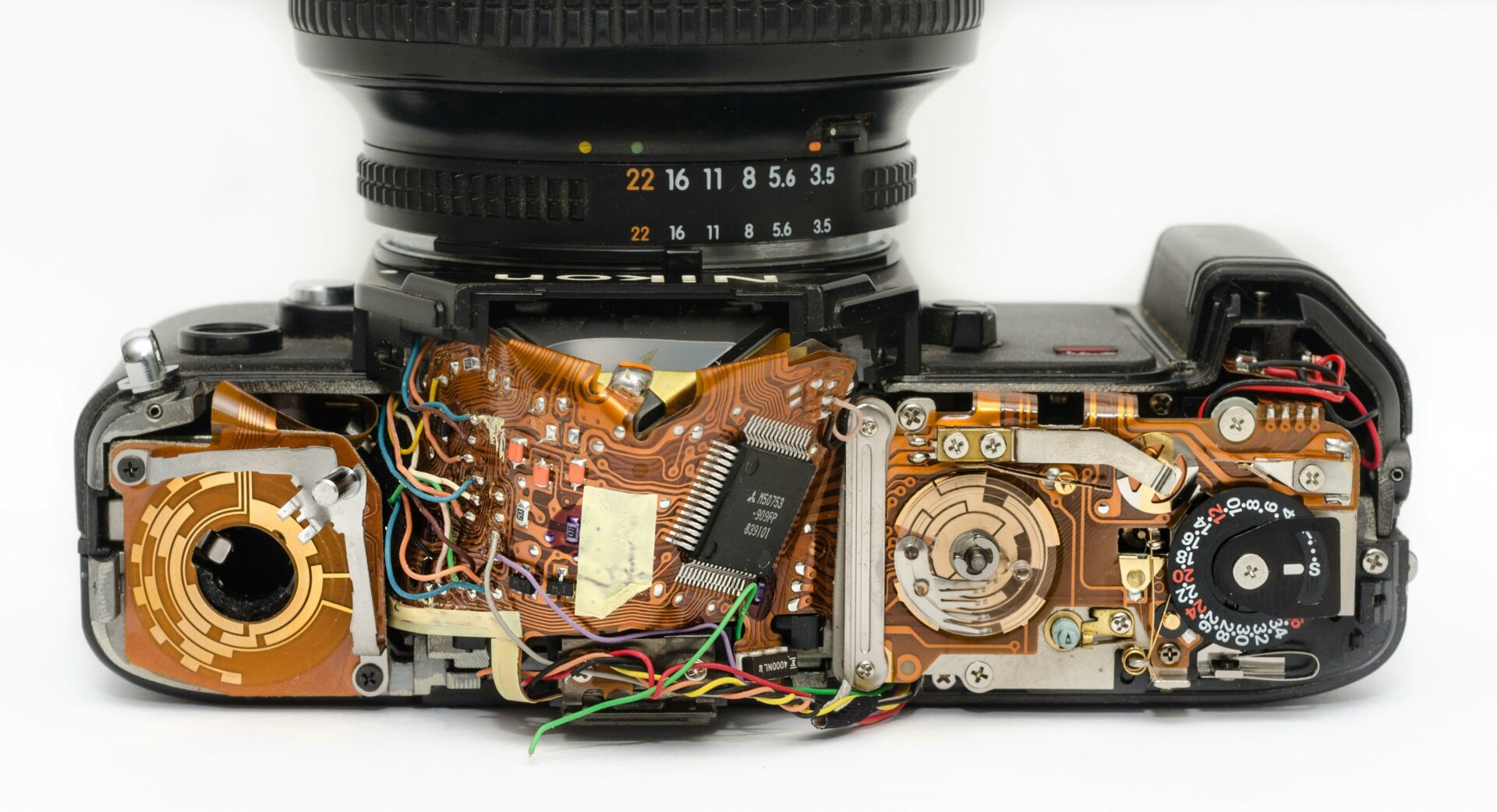 Camera has been taken apart and you can see all the little parts inside.